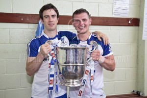 Dermot Malone and Martin McElroy with the Anglo Celt Cup in the dressing room on Sunday.