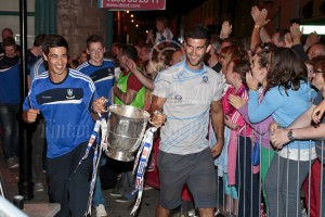 Conor Galligan and Neil McAdam with the Anglo-Celt Cup in Monaghan town at Monday night's reception.