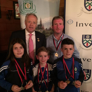 Our World Handball champions with Ulster Council President Martin McAviney
