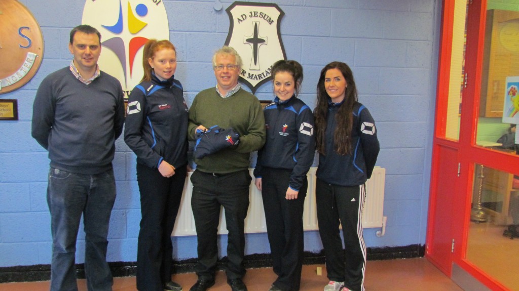 Pete Mc Mahon Supervalue sponsor of tops for senior ladies team prior to Ulster A final, also in photo Alanna O'Donaghue captain and Aoife Duffy VICE CAPTAIN, team management Tony Graham and Roisin O'Keefe